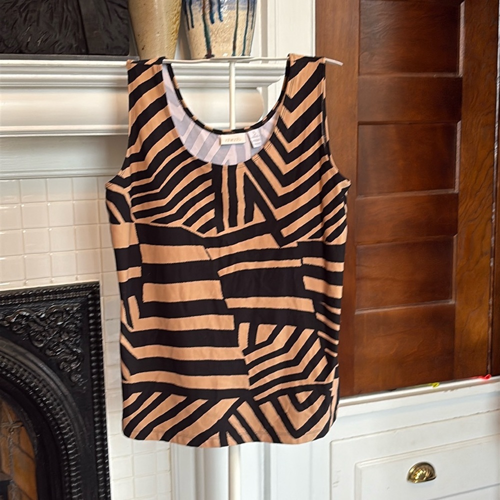 Chicos zebra print stretch tank. Worn a few times.‎ In very good shape